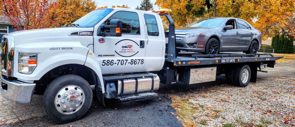 Good Hands Towing Tow Truck jump starts